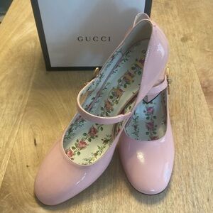 Gucci Pink patent leather babydoll shoe with beautiful Butterfly detail buckle.